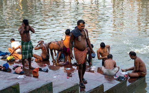 India-Kolkata-Men-Washing-In-Hooghly-River