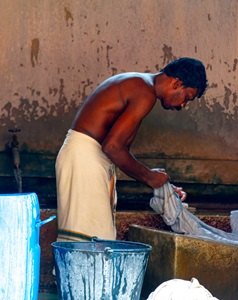India-Cochin-Man-Washing-Clothes