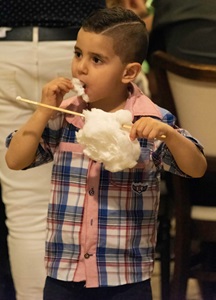 Israel-Akko-Boy-Eating-Cotten-Candy