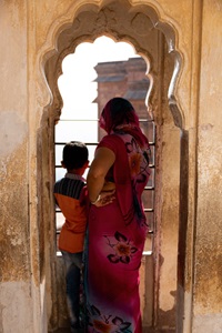 India-Jodhpur-Woman-Boy-Looking-Out-Window